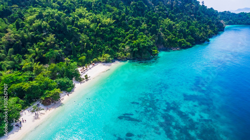 Aerial view of nature clear blue sea water with topical beach forest Andaman sea, Traveling Myanmar Thailand, Top view from drone, Beautiful destination place Asia, Summer holiday vacation travel trip © day2505