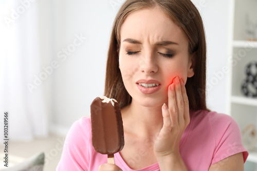 Young woman with sensitive ...