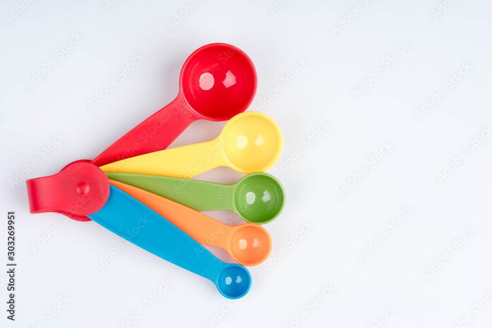 Set of measuring spoons made of colored plastic Set of measuring spoons made of colored plastic
