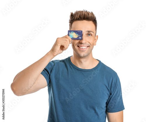 Young man with credit card ...