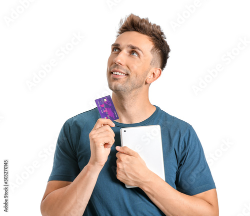 Young man with credit card ...