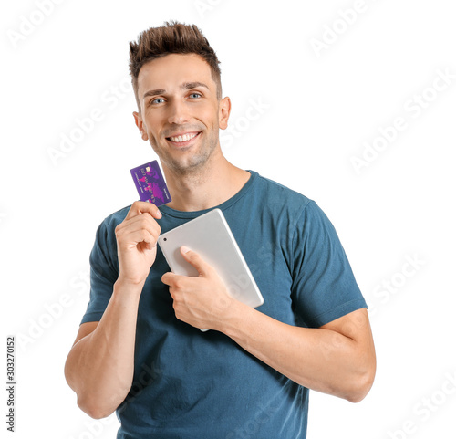 Young man with credit card ...