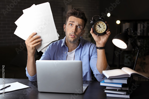 Tired man trying to meet de...