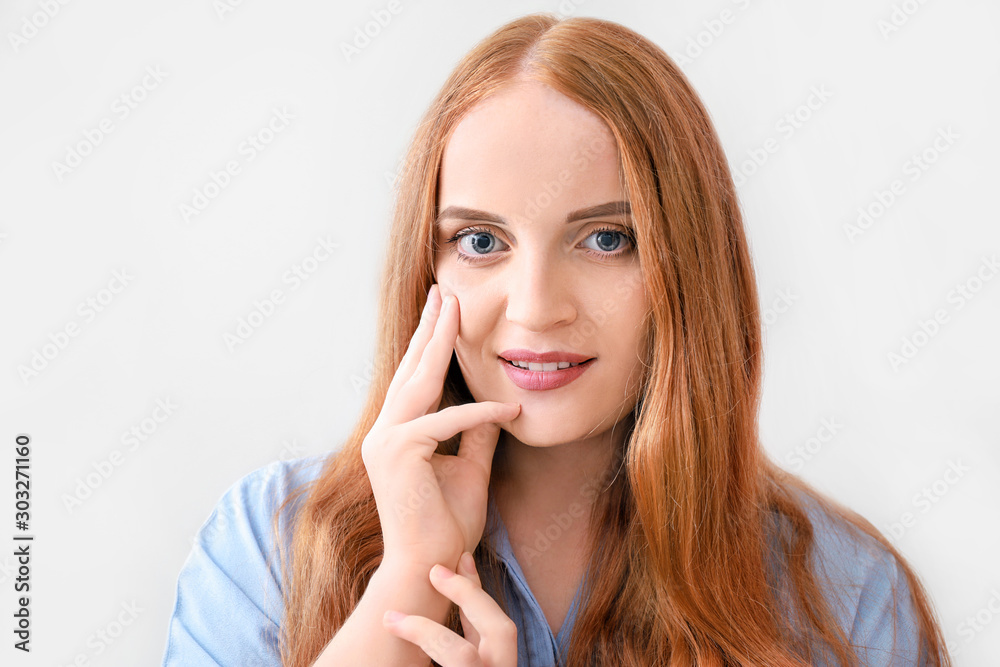 Portrait of beautiful young woman on white background Portrait of beautiful young woman on white background
