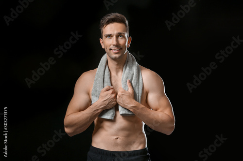 Athletic shirtless man with...