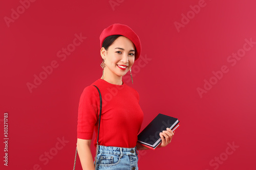 Fashionable Asian woman wit...