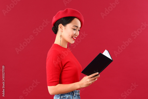 Fashionable Asian woman wit...