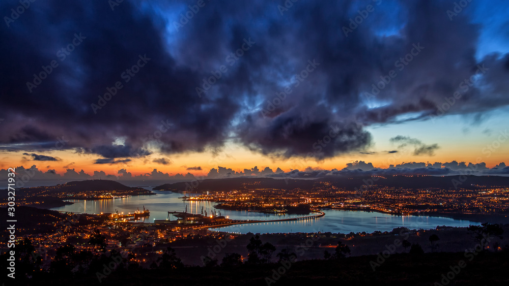 Panoramic View of Ferrol Estuary with Bridge and Shipyards Stormy Sky at Dusk La Coruña Galicia