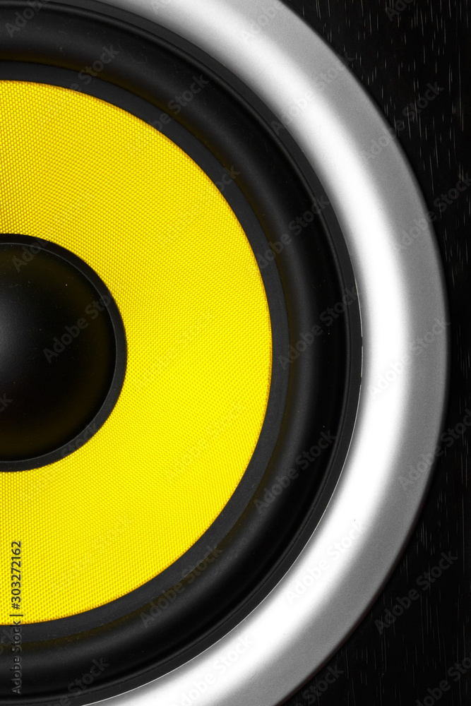 Yellow speaker loudspeaker close-up part of a musical column Yellow speaker loudspeaker close-up part of a musical column
