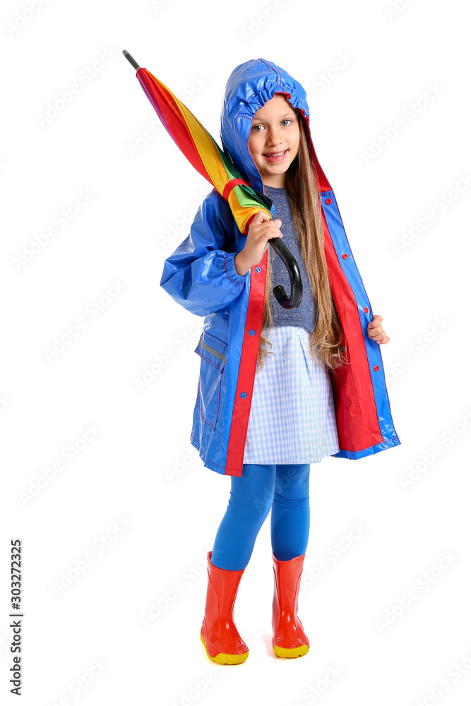 Fashionable little girl in autumn clothes and with umbrella on white background