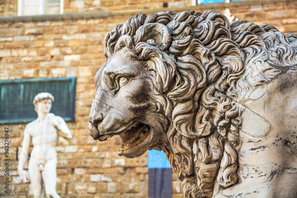 Fototapeta premium Antique sculpture - head of ferocious lion