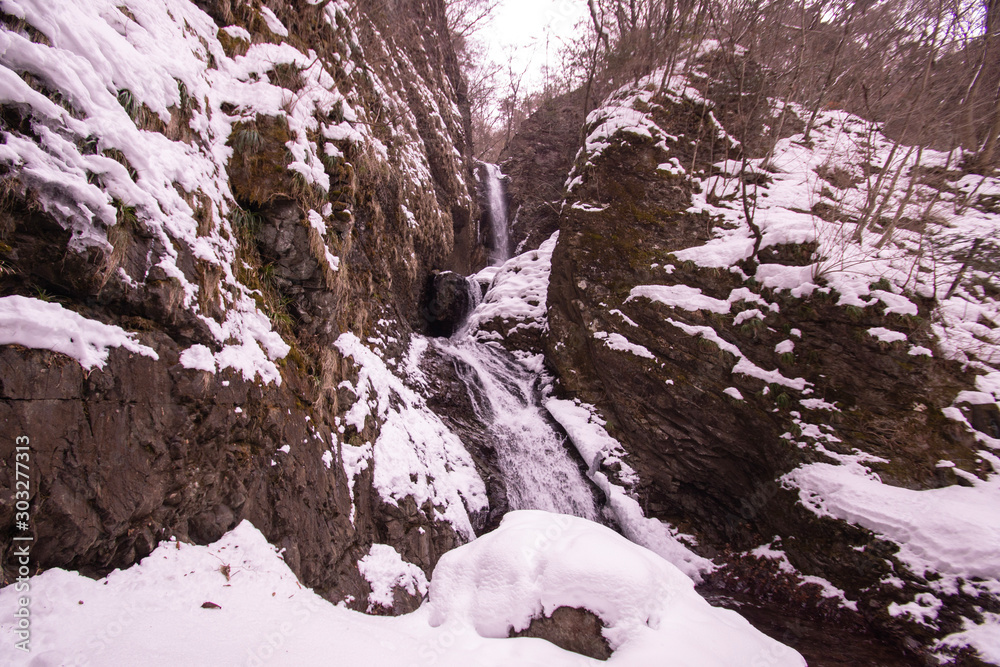 Snow scene and waterfall