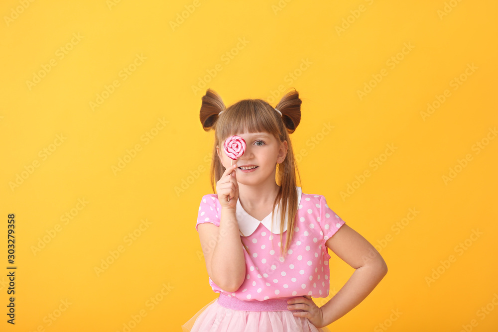 Cute little girl with lollipop on color background Cute little girl with lollipop on color background