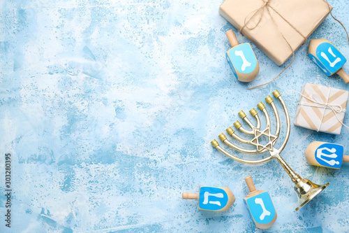 Beautiful composition for Hannukah on color background photo