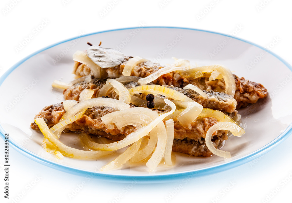 Marinated herrings on white background Marinated herrings on white background