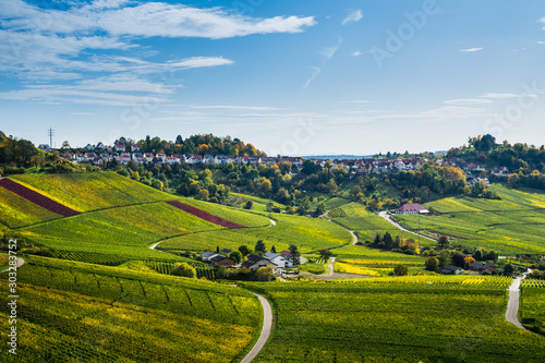 Germany, Beautiful little village of stuttgart district rotenberg, a city on a hill surrounded by colorful vineyards in impressive nature landscape