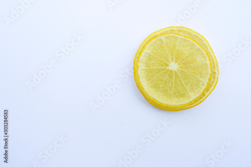 Fresh organice Yellow lemon sliced put together on white background, Isolated
