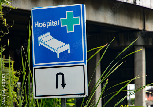 Information sign on the direction of the road to the hospital. photo