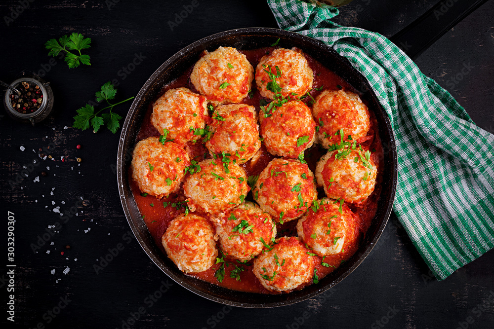 Meatballs in sweet and sour tomato sauce. Top view, overhead Meatballs in sweet and sour tomato sauce. Top view, overhead