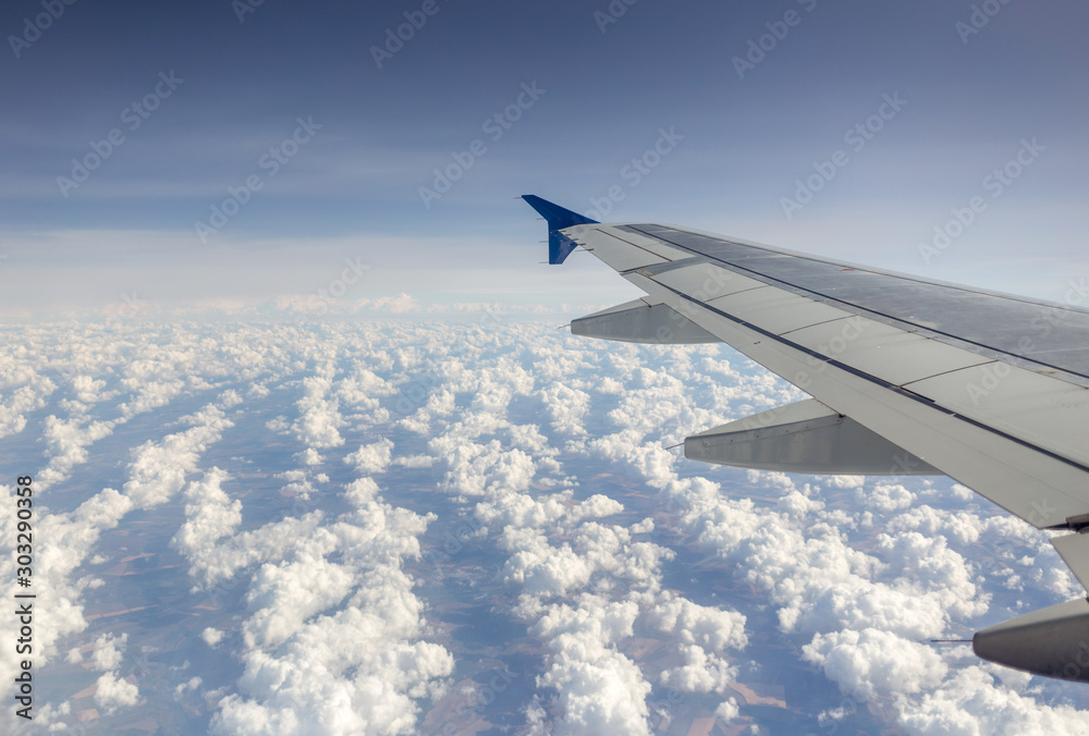 Beautiful aerial view seen through window of flying aeroplane. Horizontal color photography. Beautiful aerial view seen through window of flying aeroplane. Horizontal color photography.