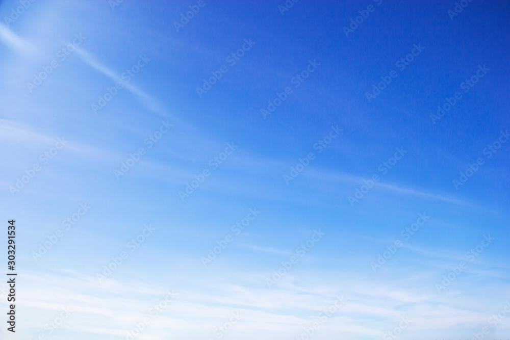 Fototapeta premium Fantastic soft white clouds against blue sky and copy space.