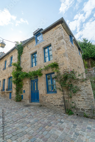 view of the historic stone houses on the Rue du Petit Fort street in old town of Dinan in Brittany
