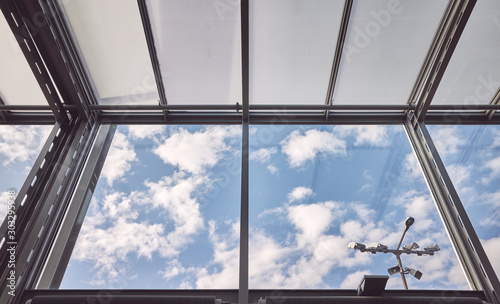 Looking at the sky through a window  color toning applied.