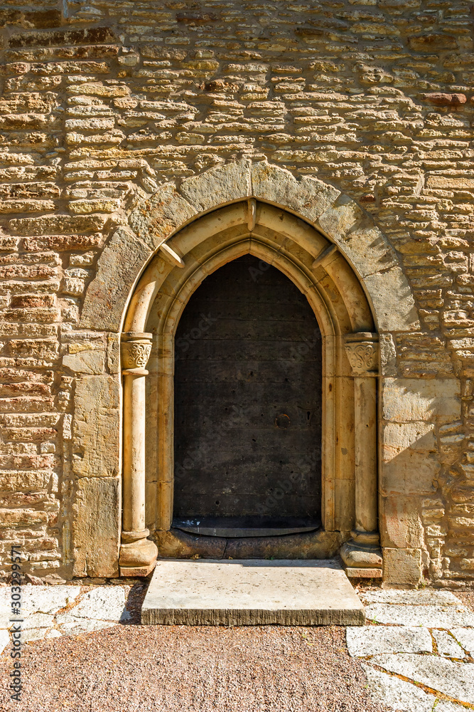 Old church door with a vaulted arch