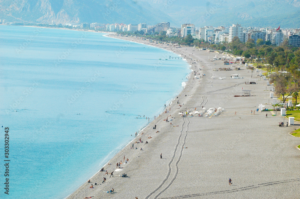 People at Konyaalti beach in Antalya, Turkey