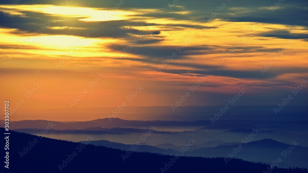 Beautiful landscape and sunset in the mountains. Hills in clouds. Jeseniky - Czech Republic - Europe. Beautiful landscape and sunset in the mountains. Hills in clouds. Jeseniky - Czech Republic - Europe.
