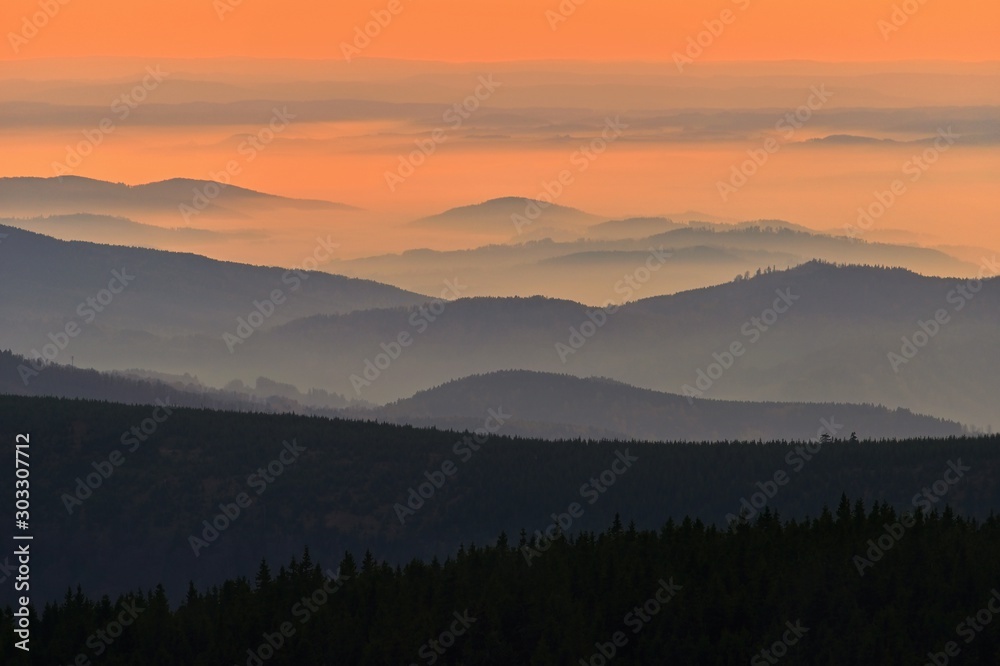 Beautiful landscape and sunset in the mountains. Hills in clouds. Jeseniky - Czech Republic - Europe.