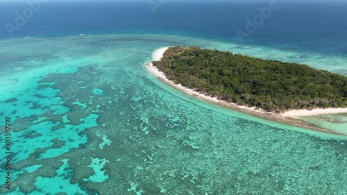 Aerial: Several approaches of Lady Musgrave Island in the Southern section of the Great Barrier Reef, Australia. An untouched paradise. photo