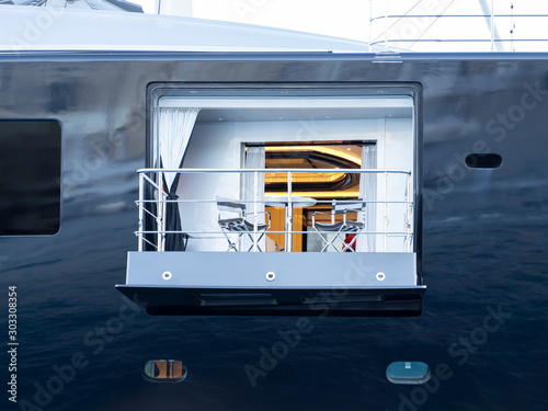 Super yacht side hinged balcony  vertically located hatch bulwark sun terrace