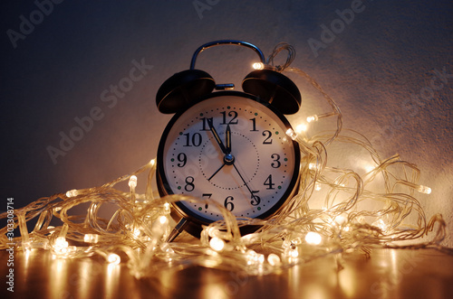 New Year alarm clock with vintage gold shining