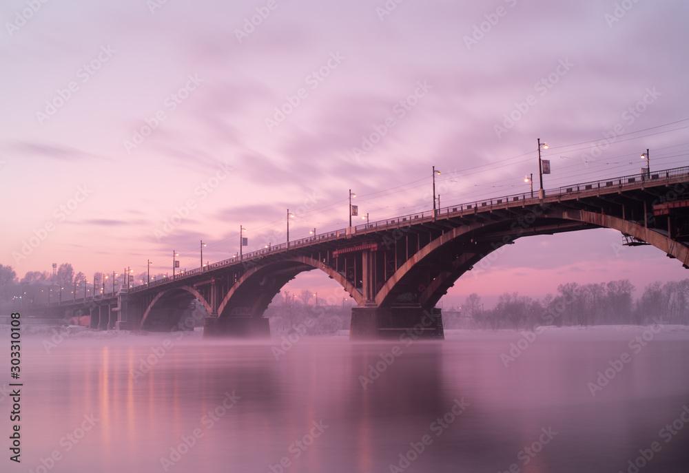 The bridge over the Angara River located in the city of Irkutsk The bridge over the Angara River located in the city of Irkutsk