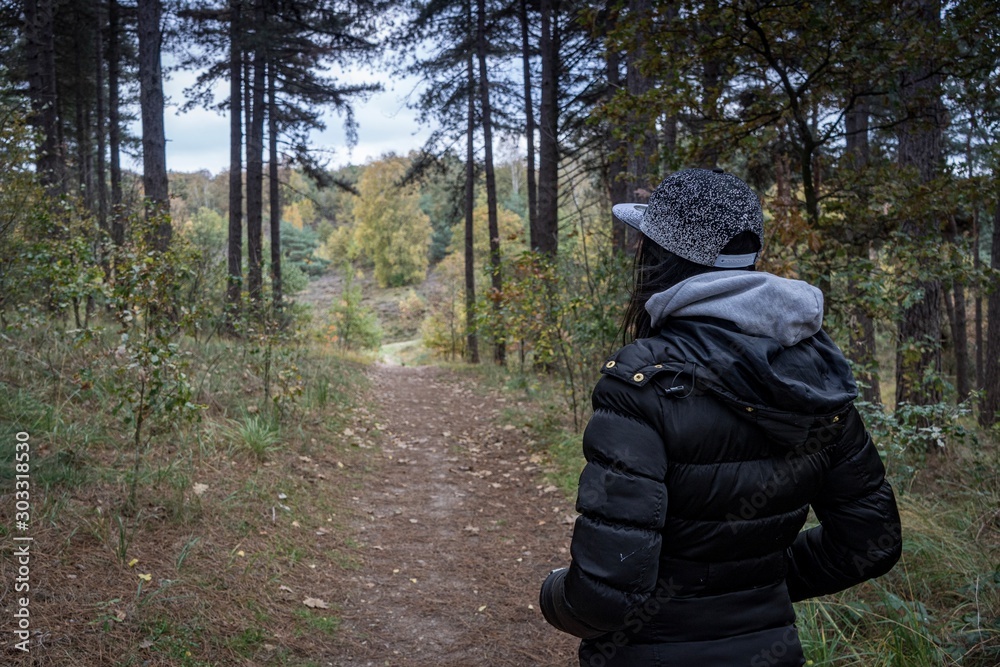 Person hiking in The forest, National Park Hoge Kempen