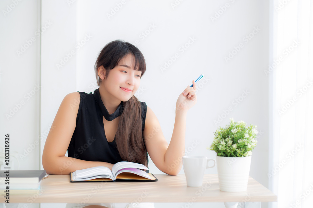 Beautiful asian woman writer thinking idea and writing on notebook or diary with happy on desk office, lifestyle of asia girl is success, female planning working, education and business concept. Beautiful asian woman writer thinking idea and writing on notebook or diary with happy on desk office, lifestyle of asia girl is success, female planning working, education and business concept.