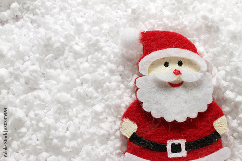 Christmas background with Santa Claus and white snow (copy space for your text). New Year background © Radila