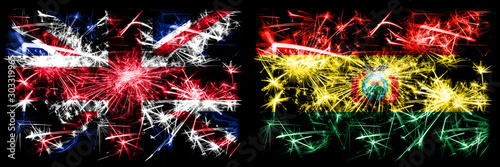 Great Britain, United Kingdom vs Bolivia, Bolivian New Year celebration travel sparkling fireworks flags concept background. Combination of two abstract states flags. © Vlad