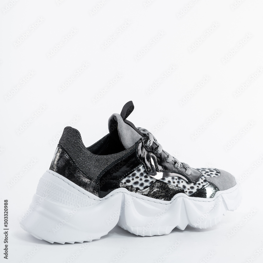 Fashionable gray womens jaguar print sneakers. original sole Stock-Foto |  Adobe Stock