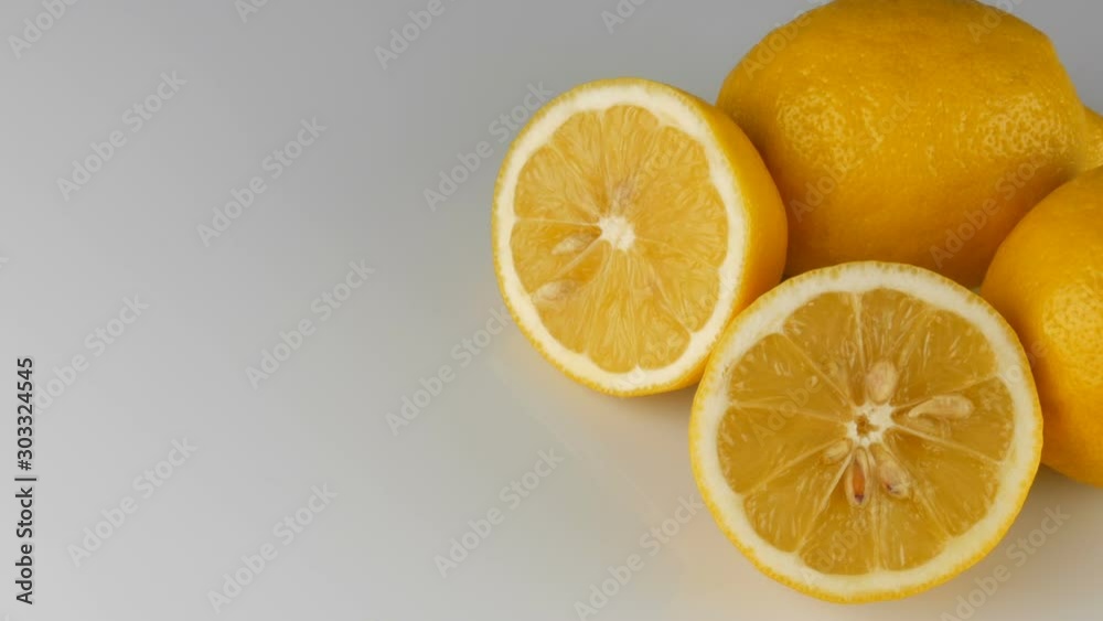 Ripe fresh juicy yellow lemon on a white background Ripe fresh juicy yellow lemon on a white background