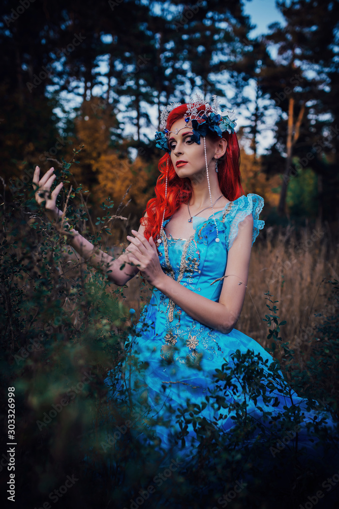 Fairy in the autumn forest