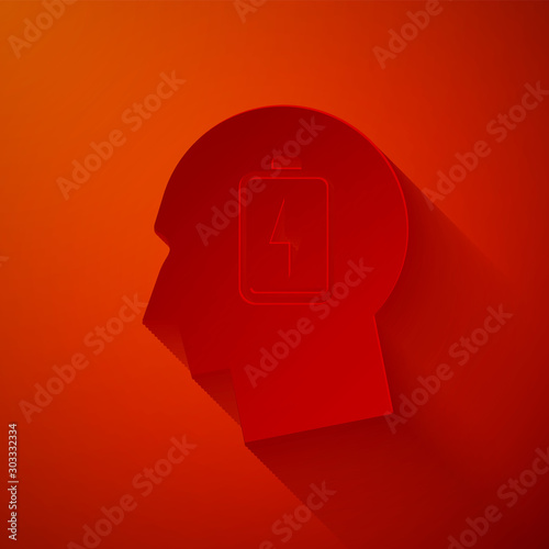 Paper cut Male head with low battery icon isolated on red background. Tired man. Paper art style. Vector Illustration