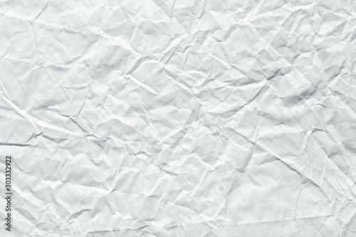 Crumpled paper background in classic white color for greeting card.