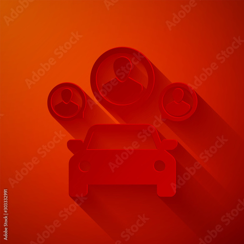 Paper cut Car sharing with group of people icon isolated on red background. Carsharing sign. Transport renting service concept. Paper art style. Vector Illustration