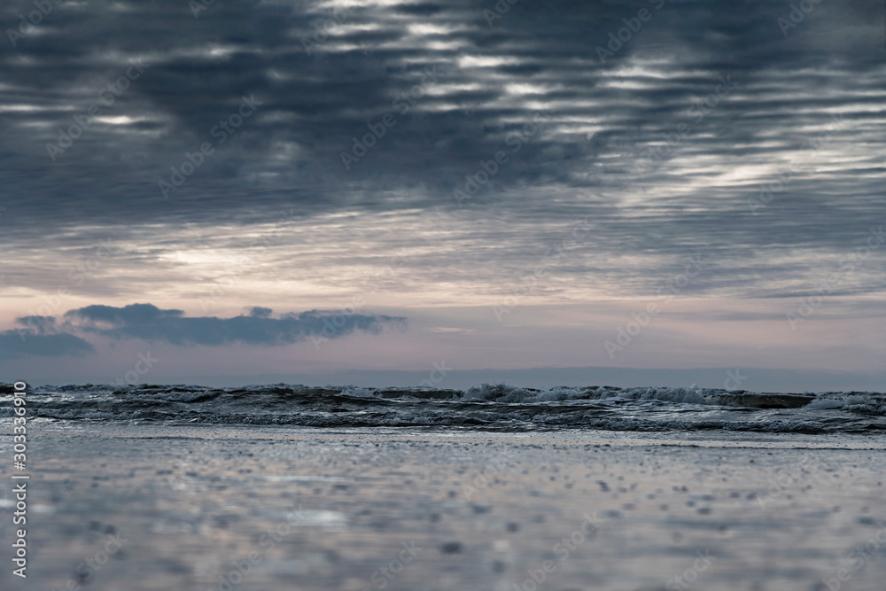 Scattered clouds over Baltic sea on calm day. Scattered clouds over Baltic sea on calm day.