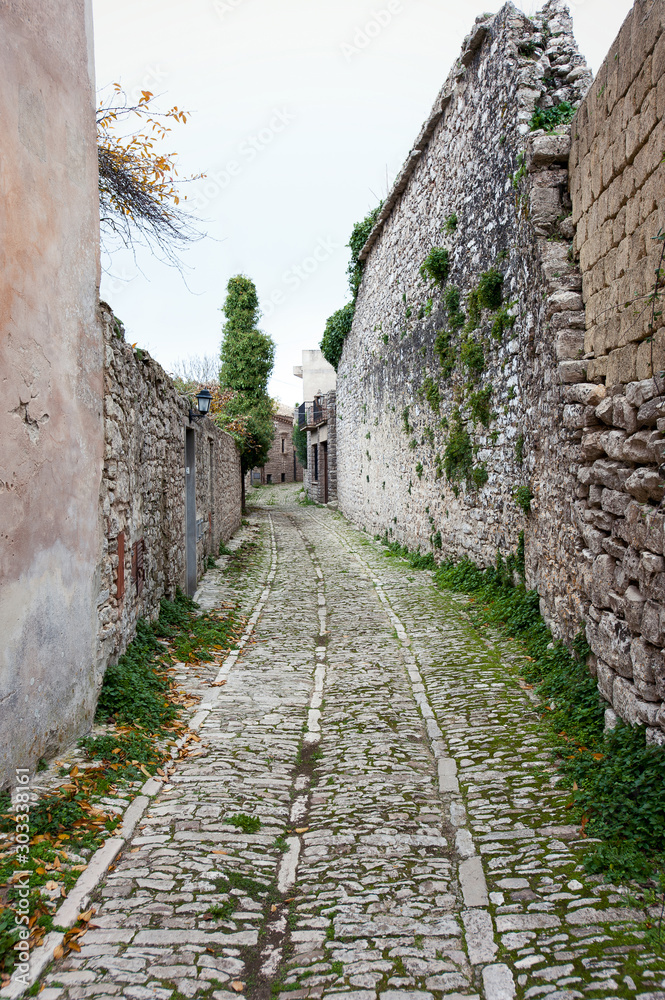Narrow stone street of Erice medieval town, Sicily, Italy