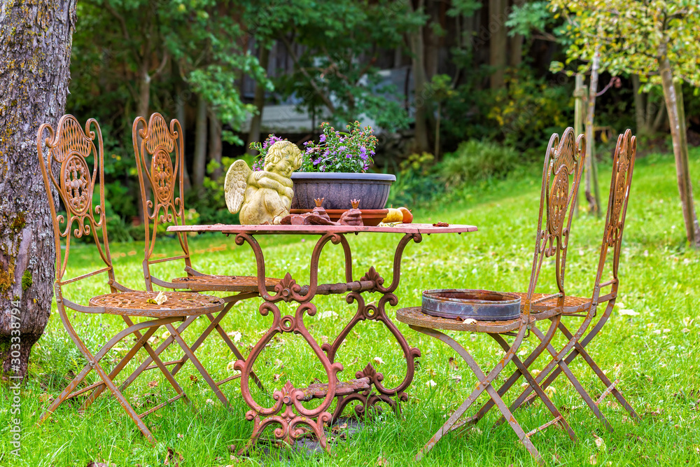 Wrought iron garden furniture in the garden