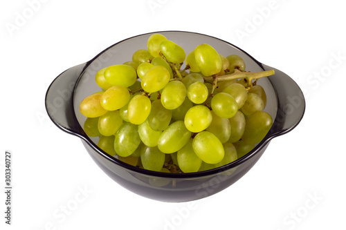  Ripe green grapes in a black transparent plate on a white background