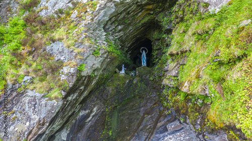 Old Slate Quarry and Grotto with statue of the Virgin Mary, Valentia Island, Ireland photo